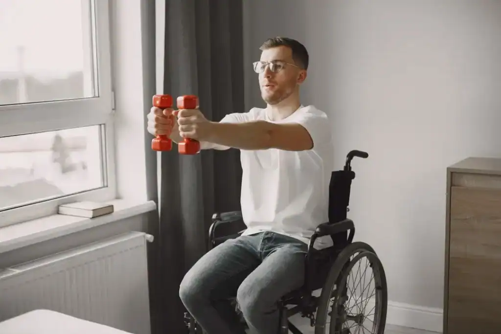 Empowering Weight Loss: A Comprehensive Guide for Individuals with Disabilities 1 Image of man doing exercise in his wheelchair to aid weight loss Daventry