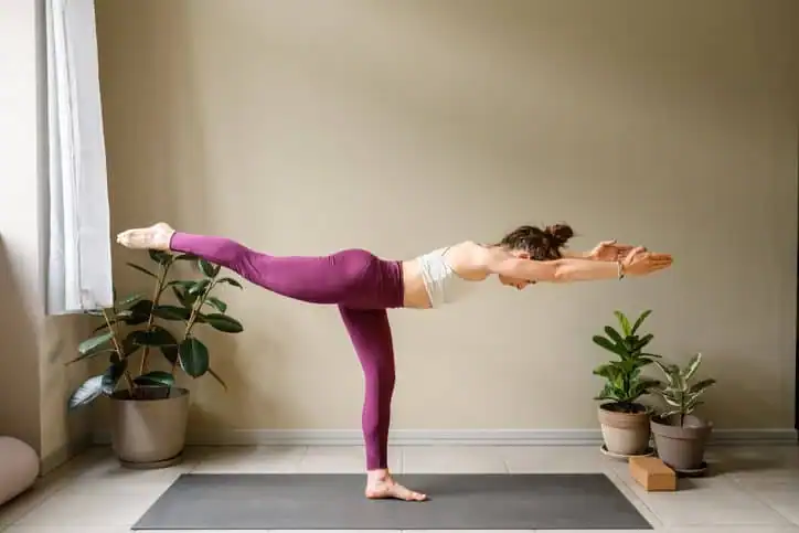 Achieving the Perfect Tone: How Often Should You Exercise for Results? 1 Woman doing Yoga exercise Daventry to help with toning the body.