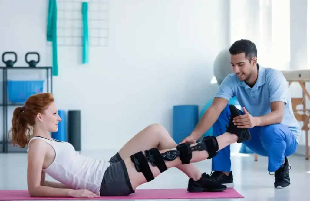 Debunking Meal Timing Myths: The Truth About Muscle Recovery 1 Woman having treatment to help muscle recovery Daventry after an injury